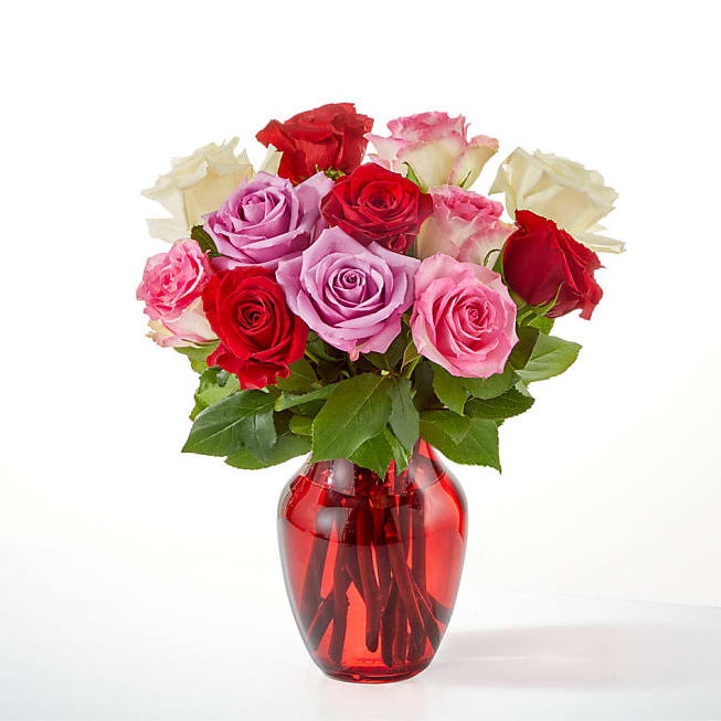RED, PINK, LAV, WHITE ROSES IN RED VASE