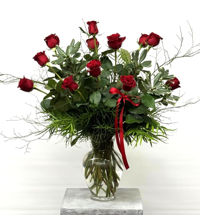Red Roses Arranged in Spring Garden Vase