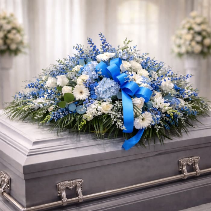 Pleasing Blue Casket Spray
