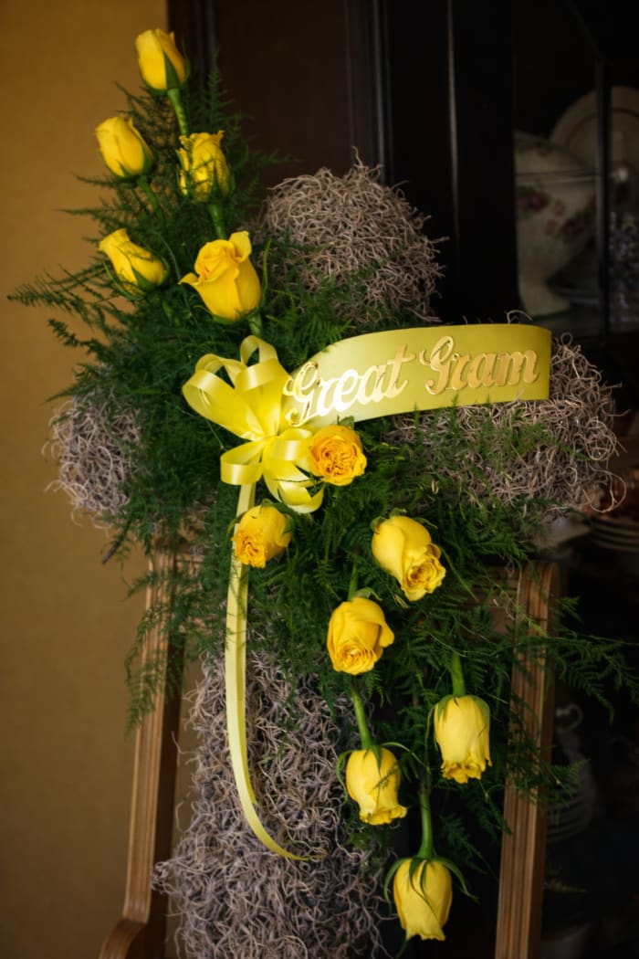 Moss Cross with Dozen Yellow Roses