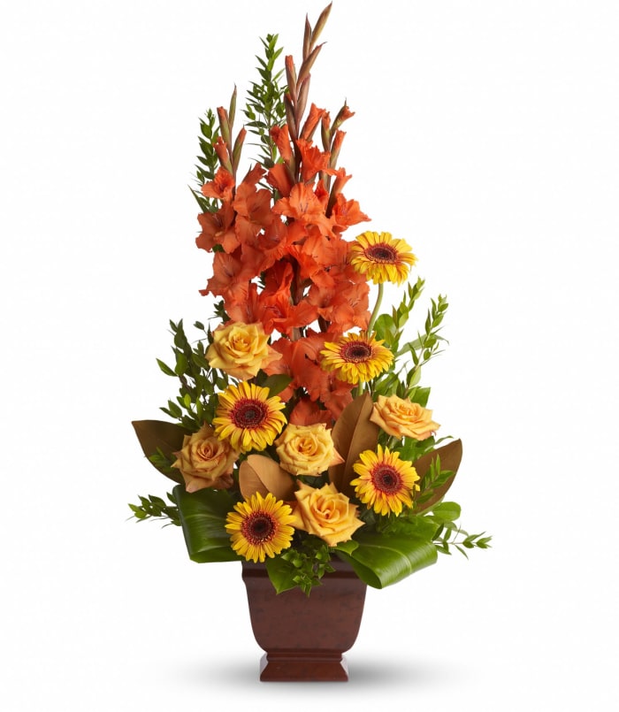 T244-1 Container Roses, gerbs, glads, ti leaves, magnolia and more