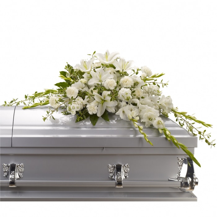 T242-4 Casket Spray - oriental lilies, glads, carns