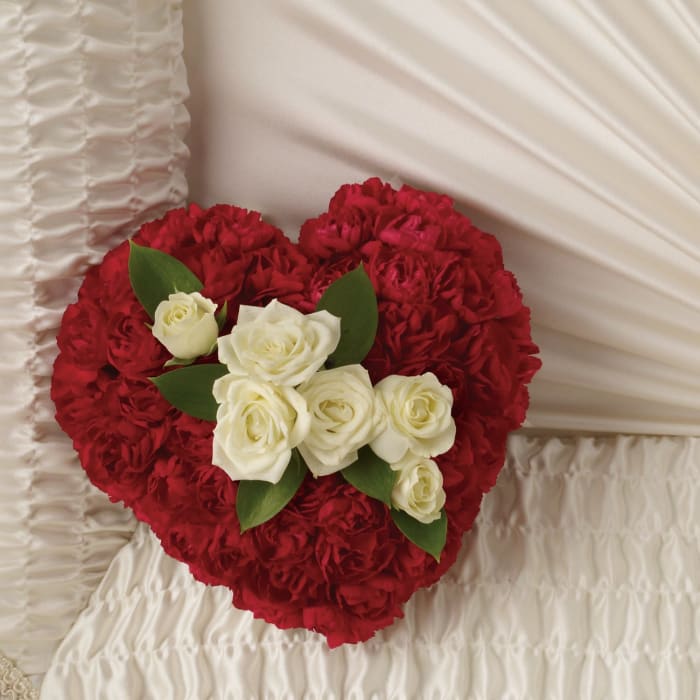 T260-2A Heart Casket Insert spray roses surrounded by mini carns