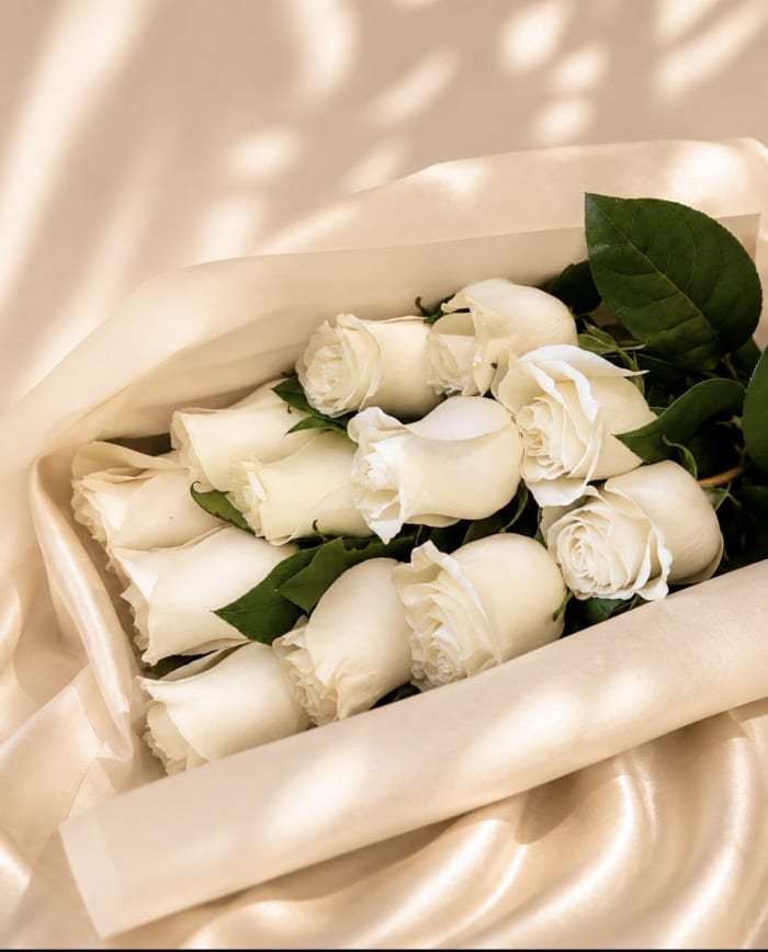 12 White Roses in a long rose box