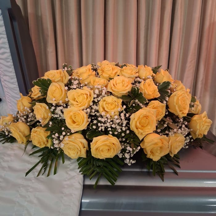 Golden Serenity Casket Spray