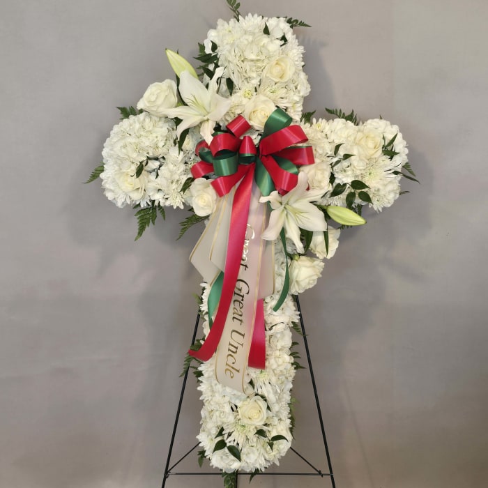 WHITE CROSS WITH GREEN AND RED BOW