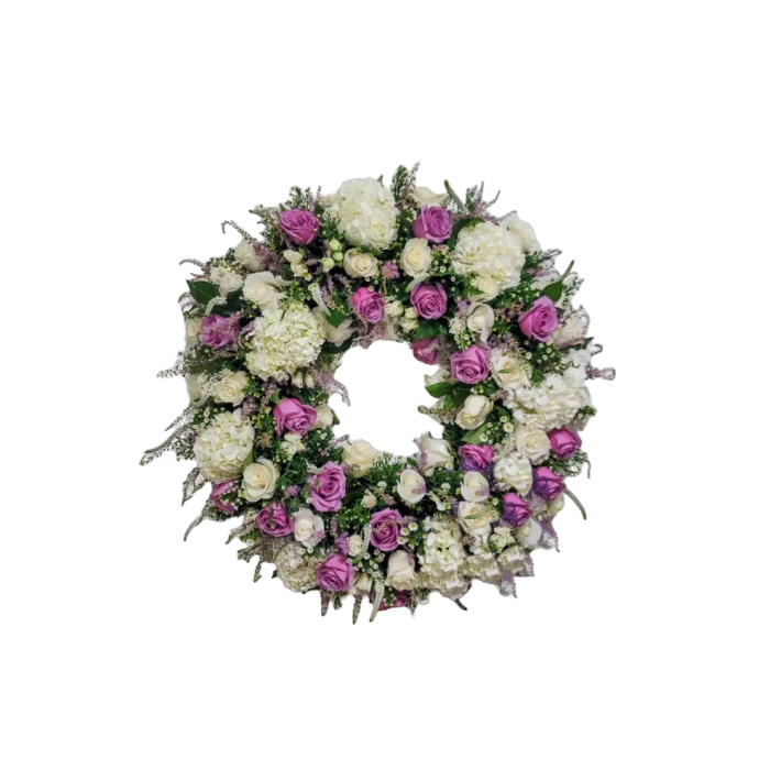 PL-08 Corona redonda de rosas, hortensias, verónicas y spray roses