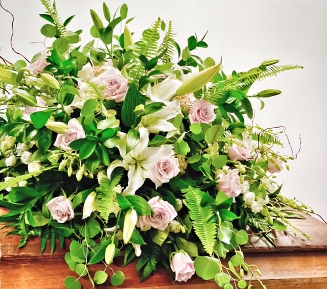 Love Surrounding Casket Spray Flower Bouquet