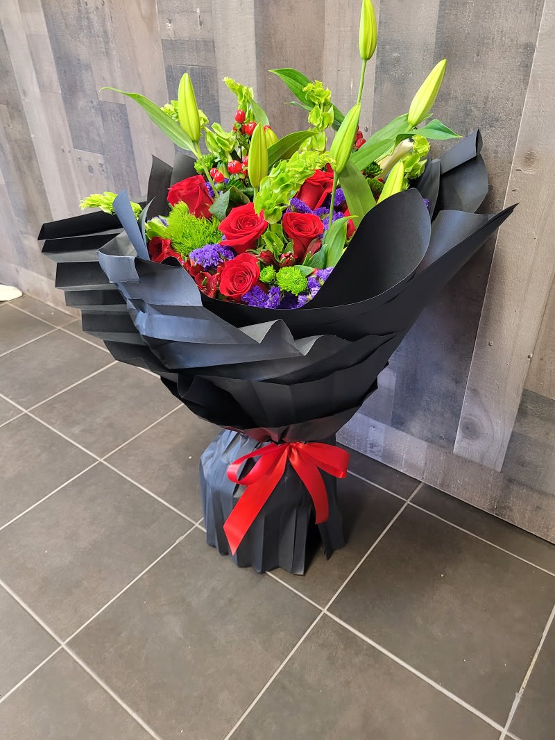 Large Elegant Blooms Wrapped in Black