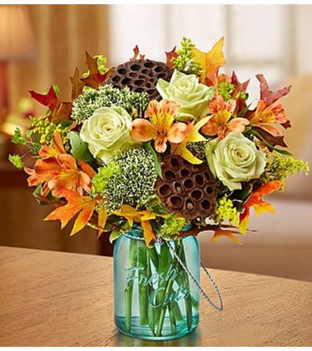Amber Waves™ in a Blue Jar Flower Bouquet