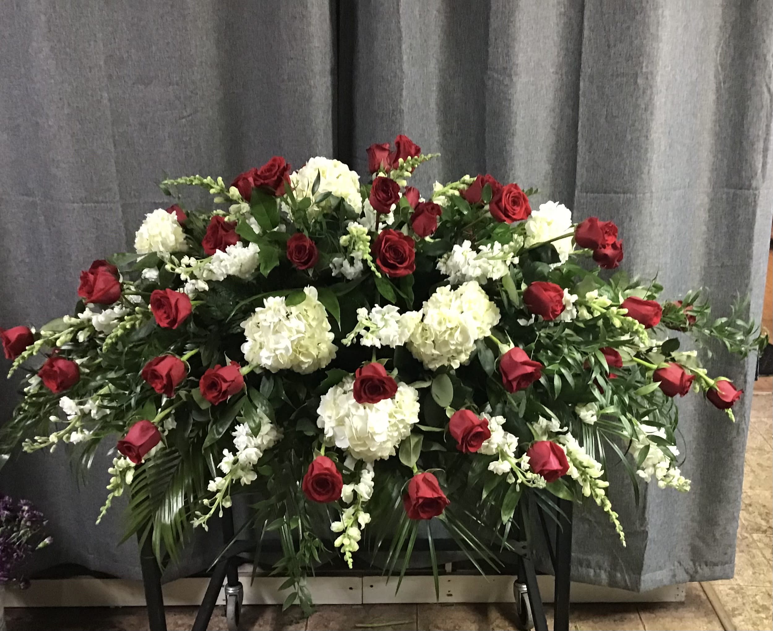 Red and White Solitude Casket Spray