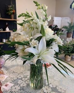 Simply White Floral Arrangement (Flowers change due to availability also Vase style might vary)