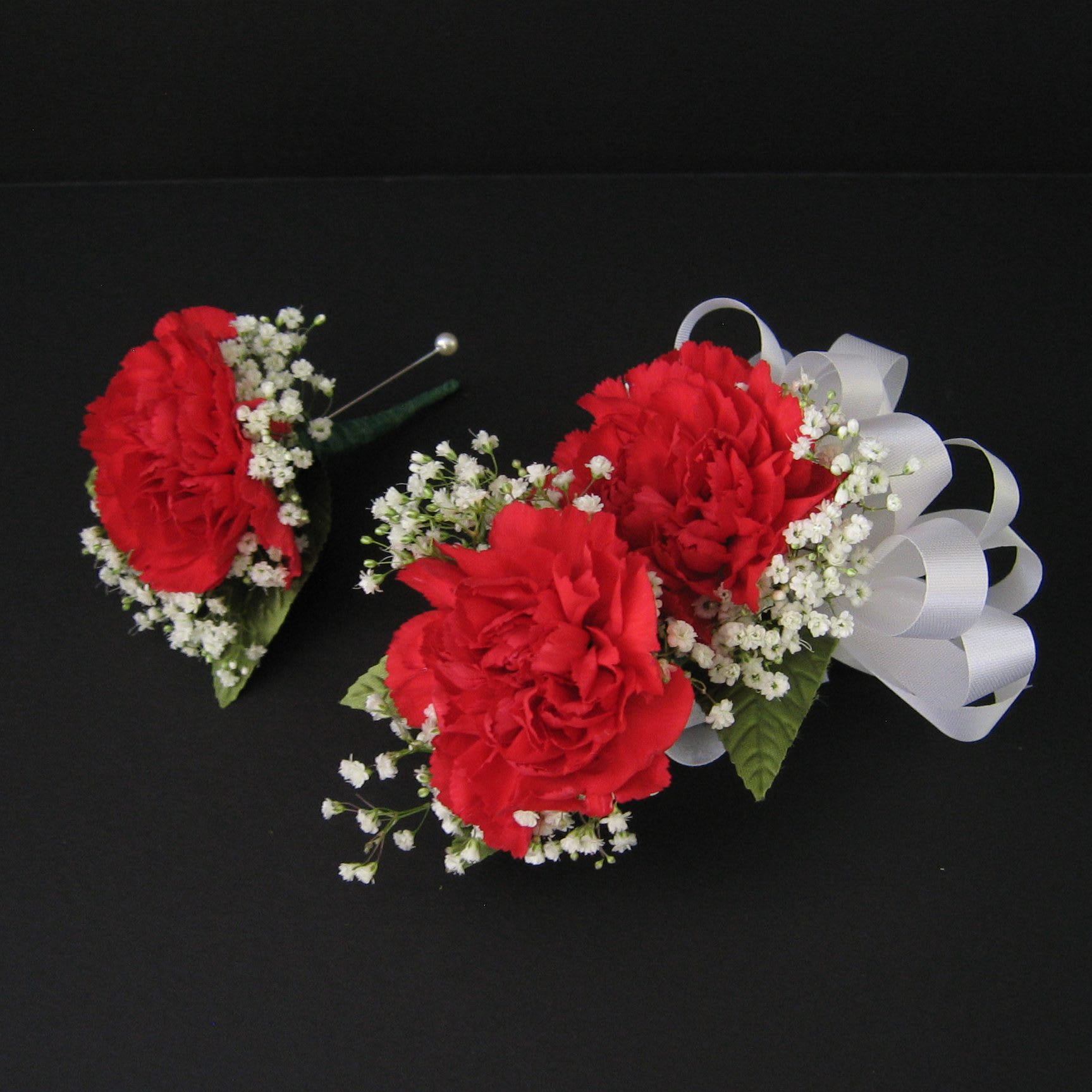 Carnation Double Corsage and Bout.