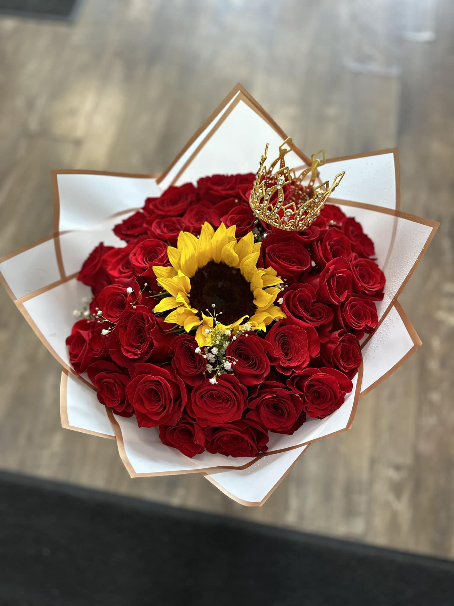 3 dozens with a sunflower Ramo Buchon