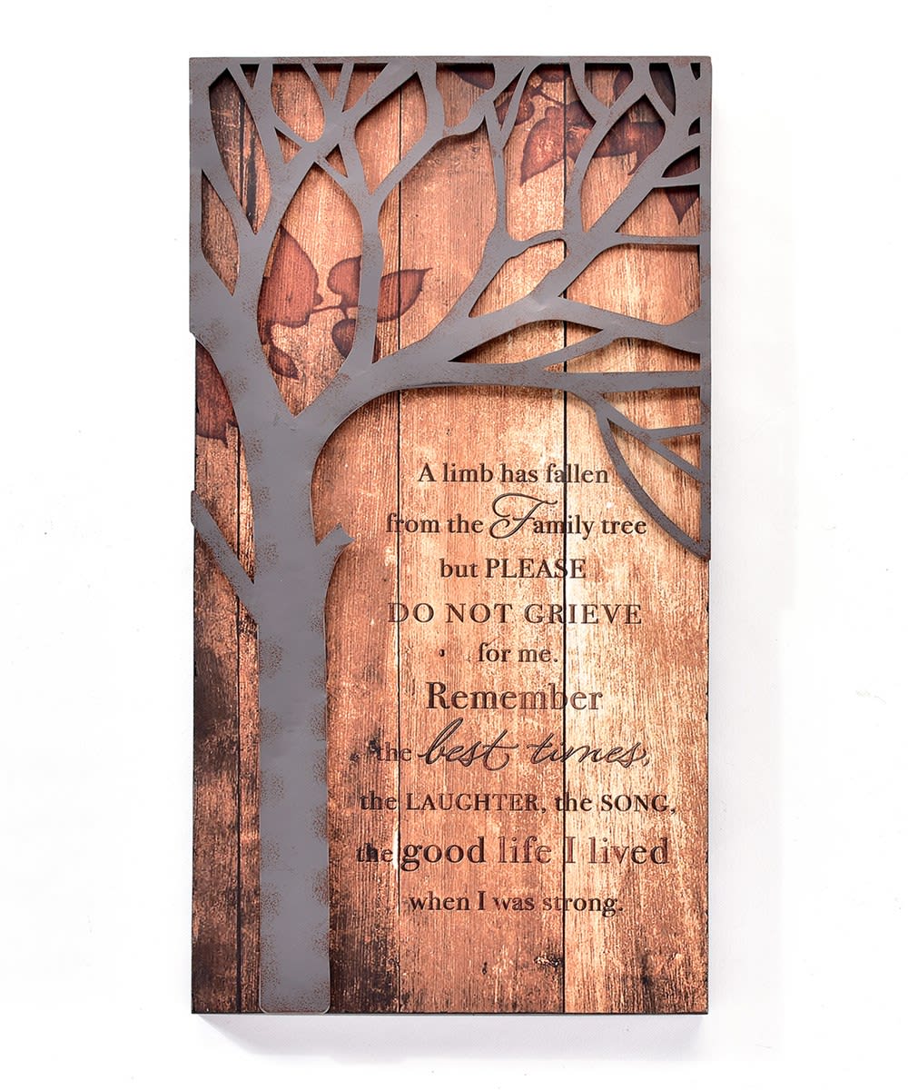 A limb has fallen wooden/metal wall plaque