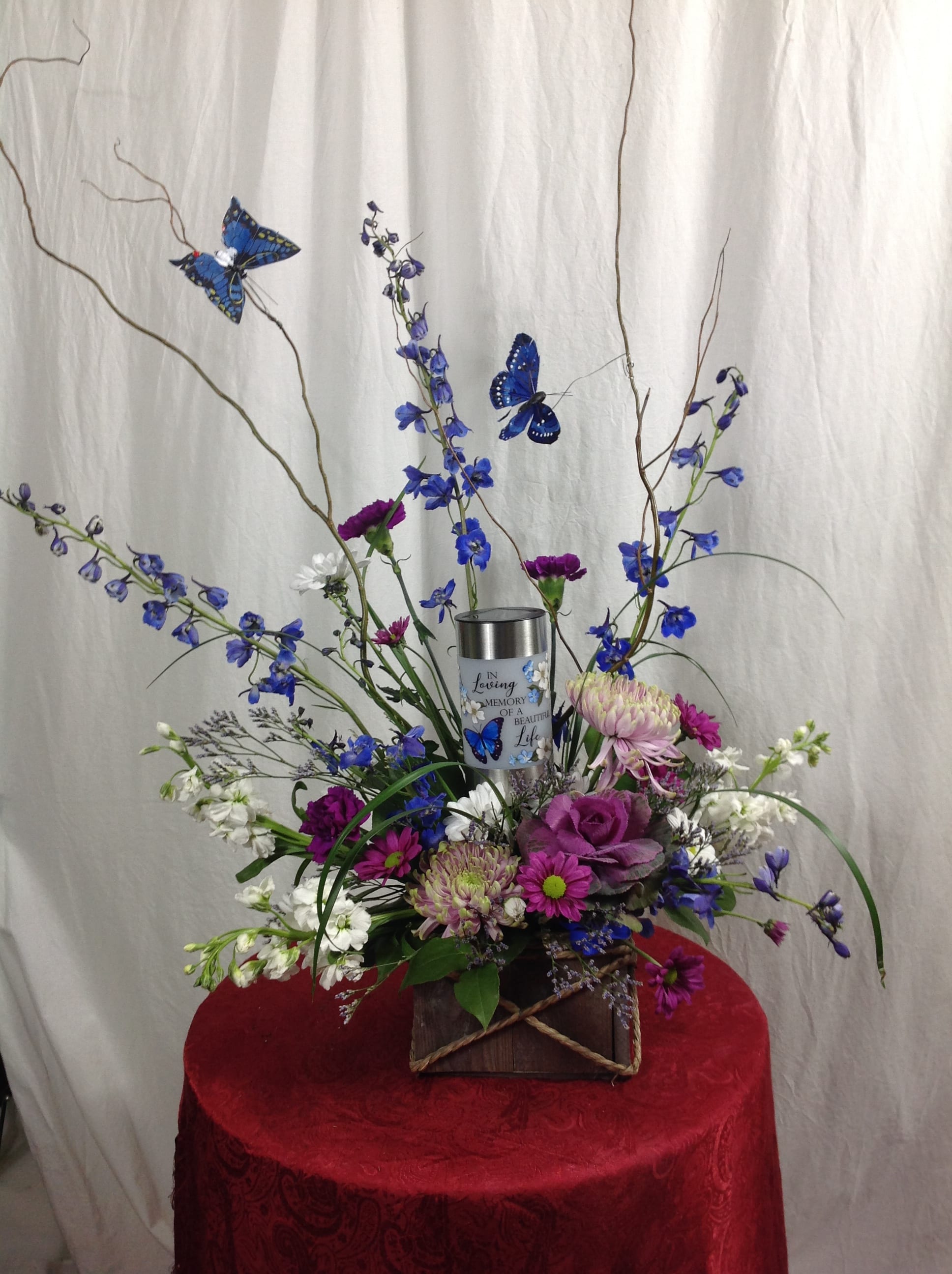 Basket with solar light and butterflies