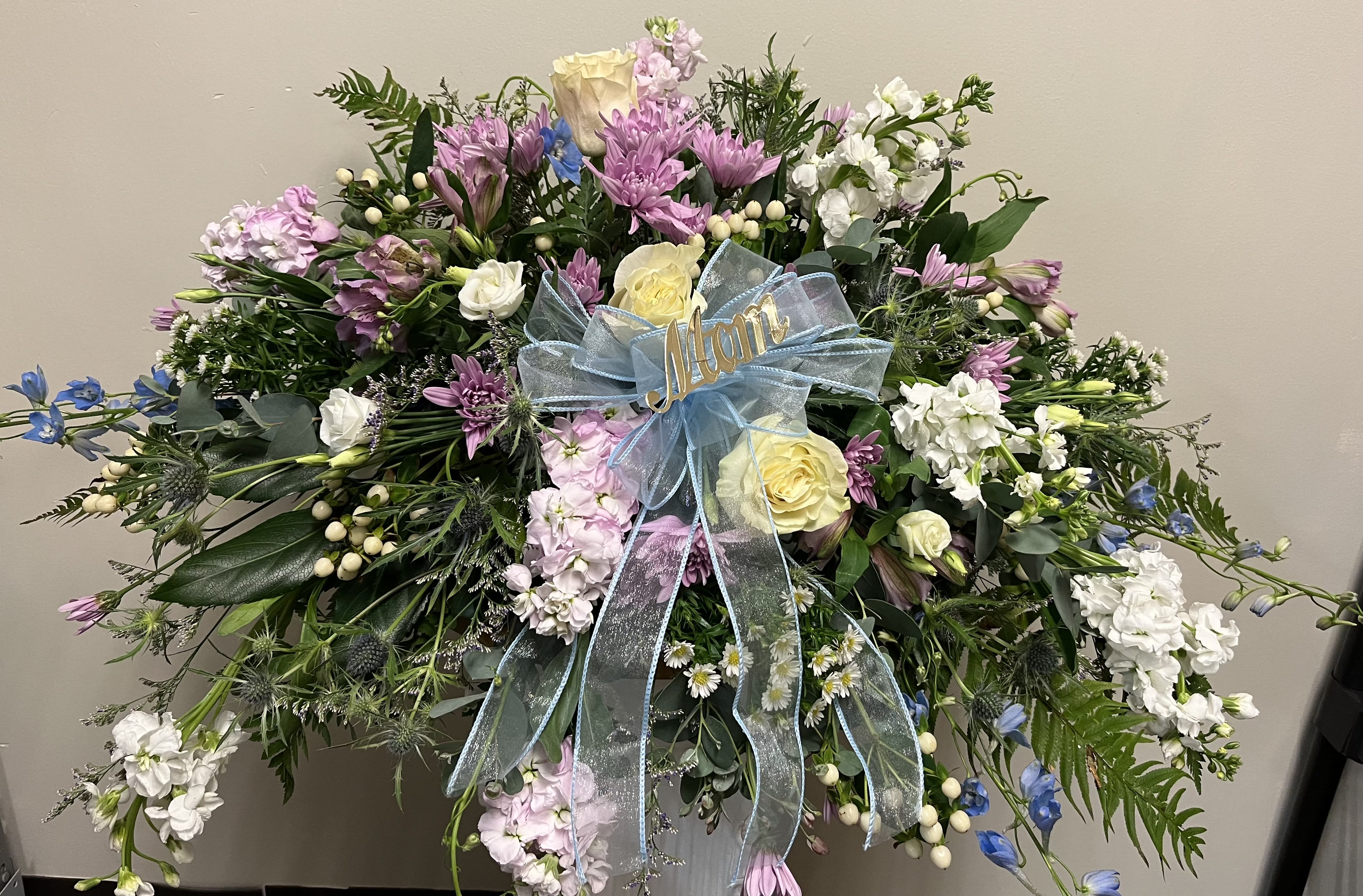 Peaceful Pastels Casket Spray