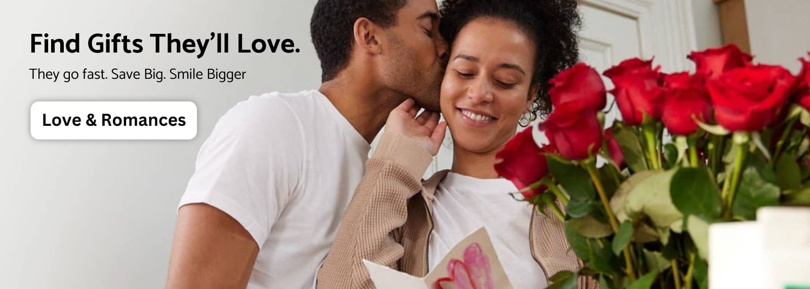 picture of a couple in love holding red roses