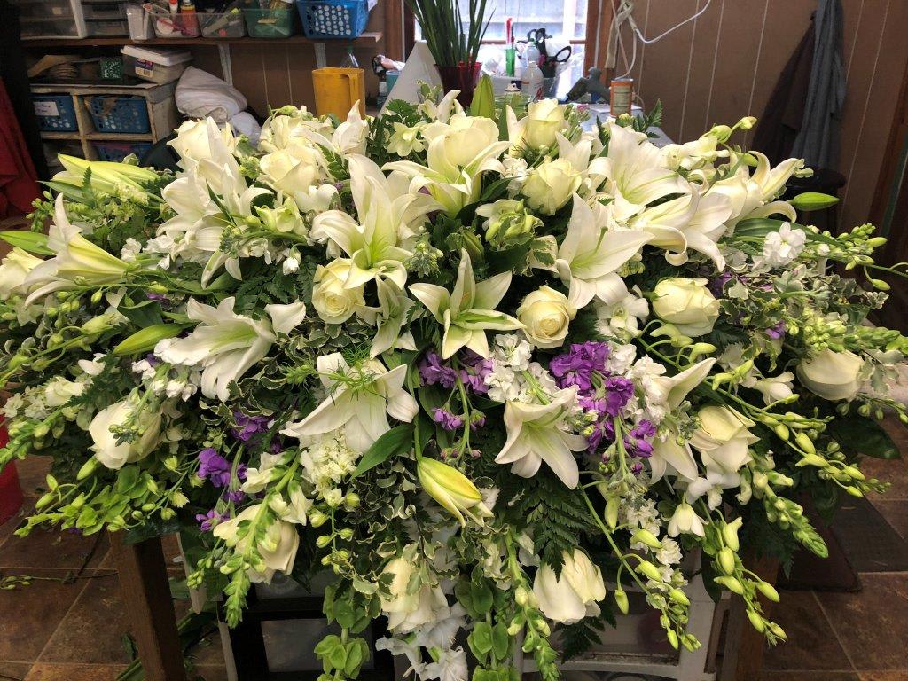 White Casket Blanket with a Splash of Purple