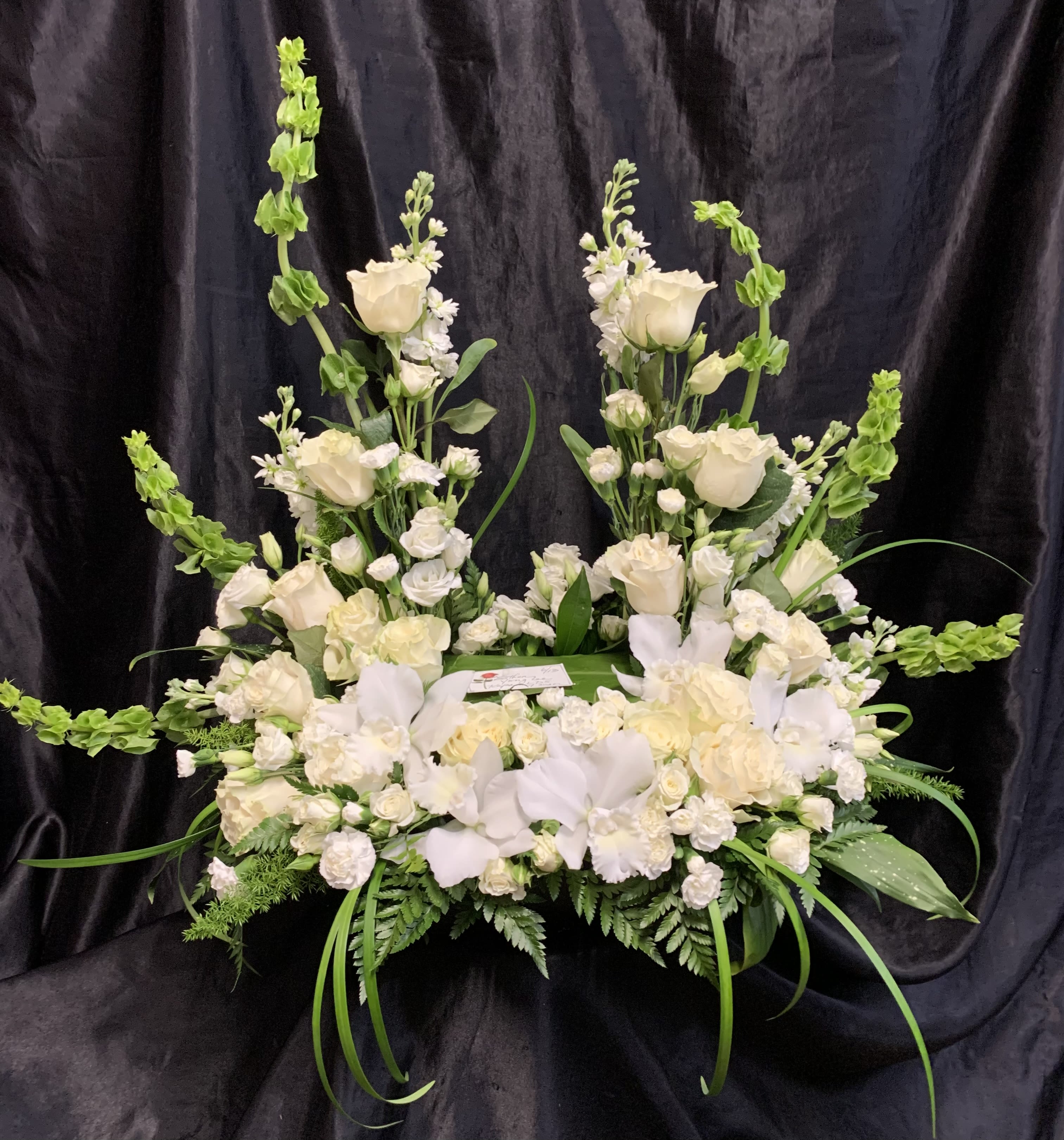 U  #2.   A U shaped floral surrounds your loved ones urn