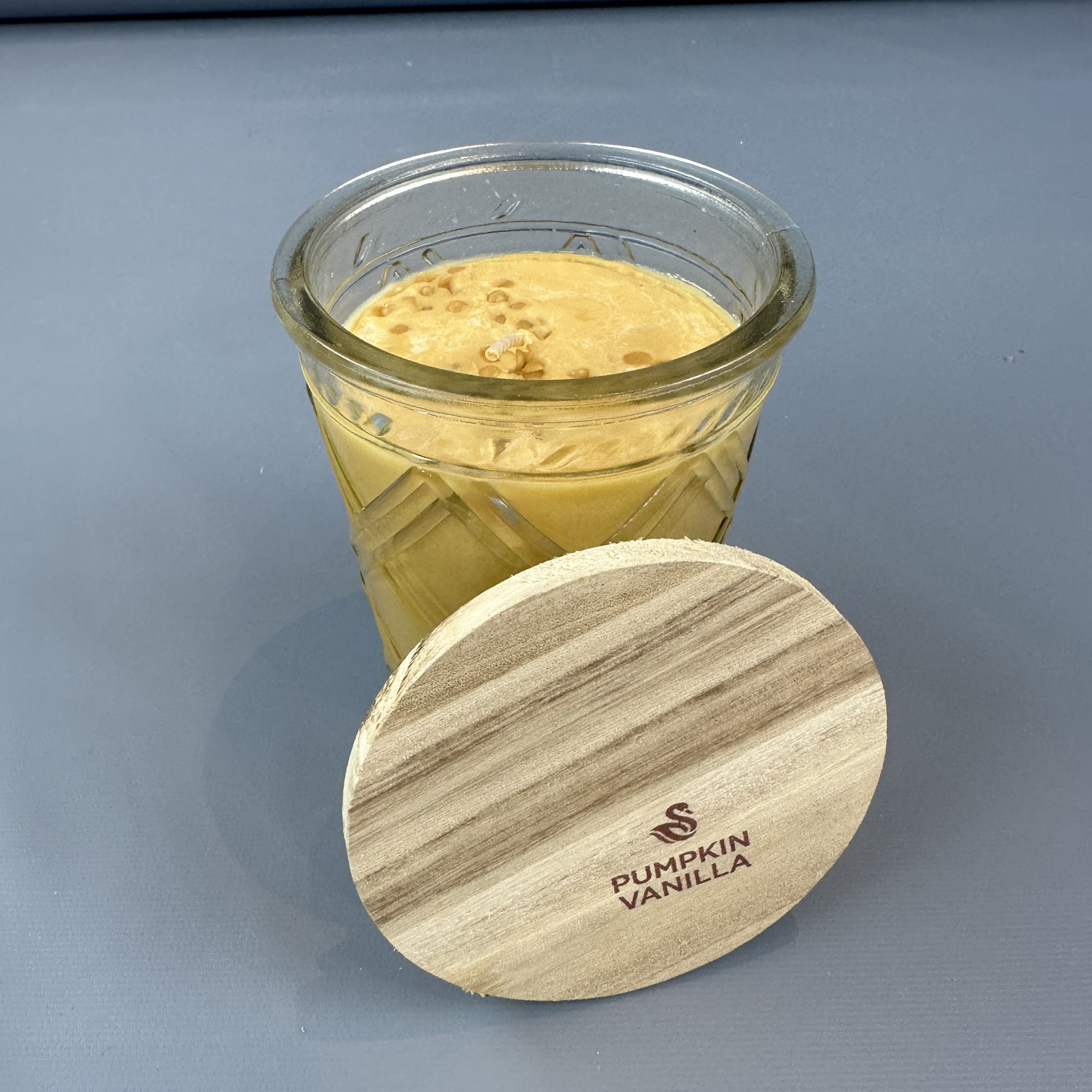 SWAN CREEK PUMPKIN VANILLA 12OZ CANDLE Flower Bouquet