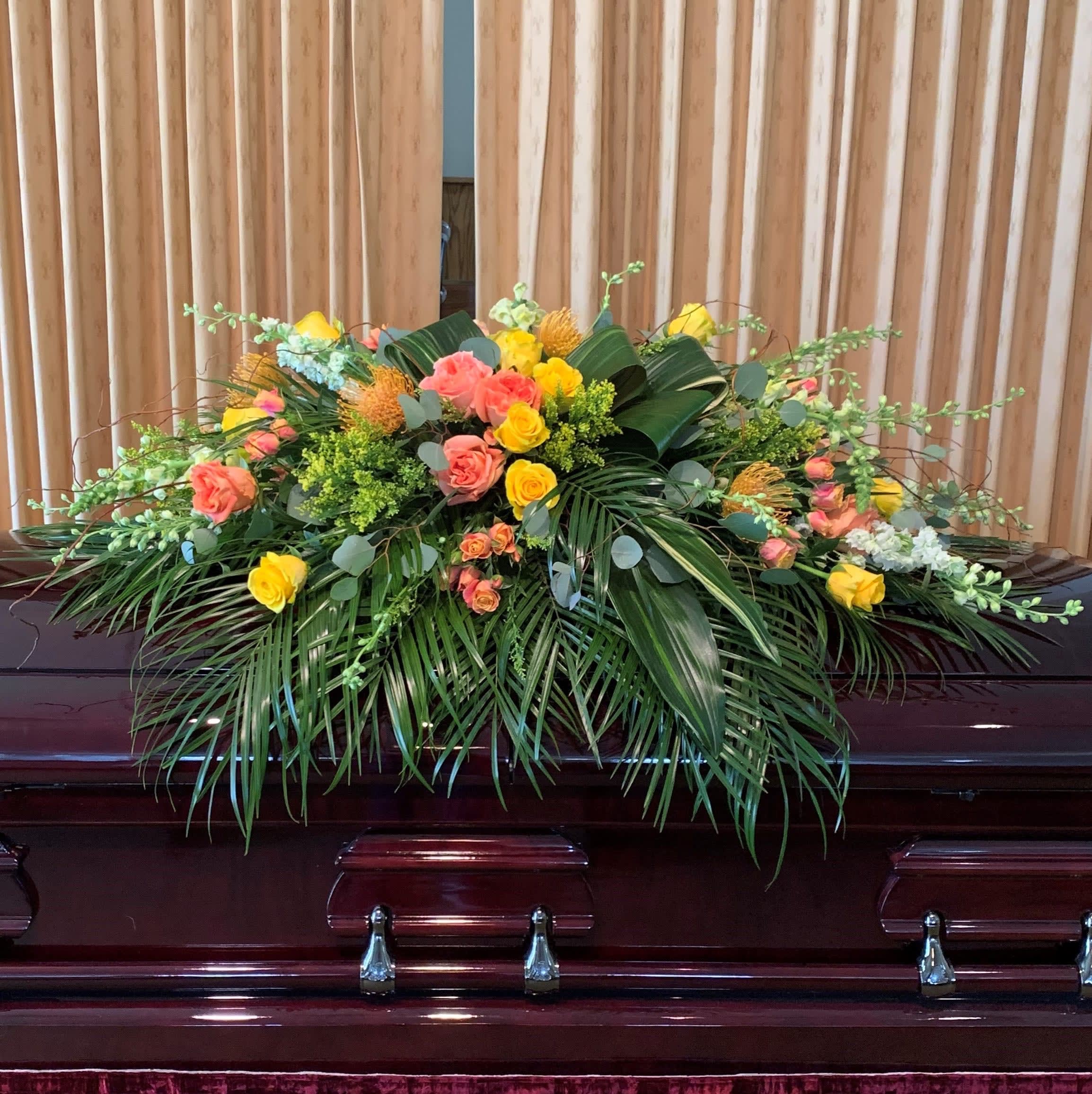 Sunsets Tribute Casket Spray