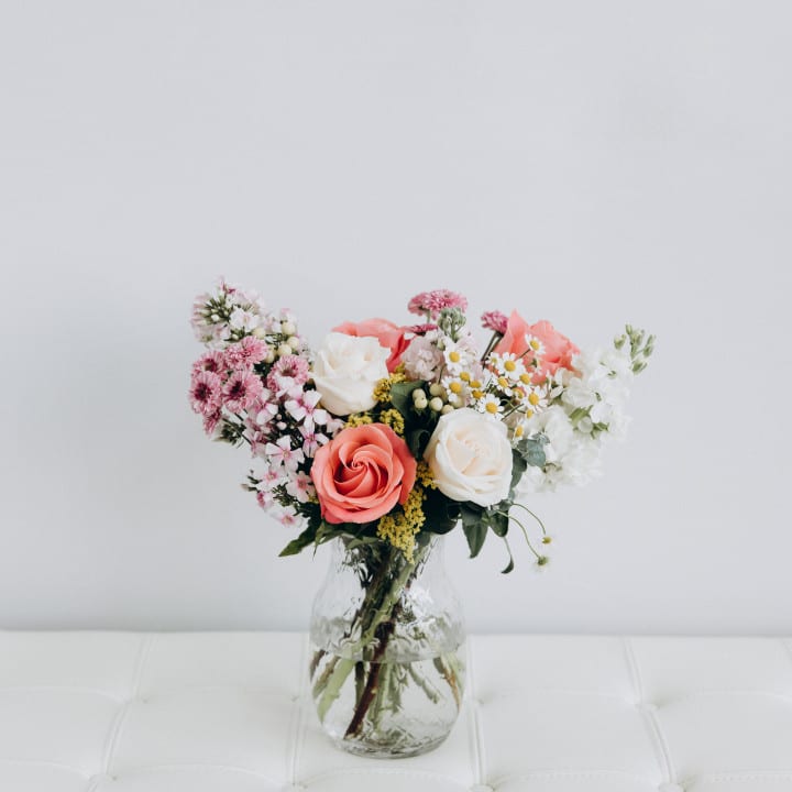 VASE ARRANGED FLOWERS