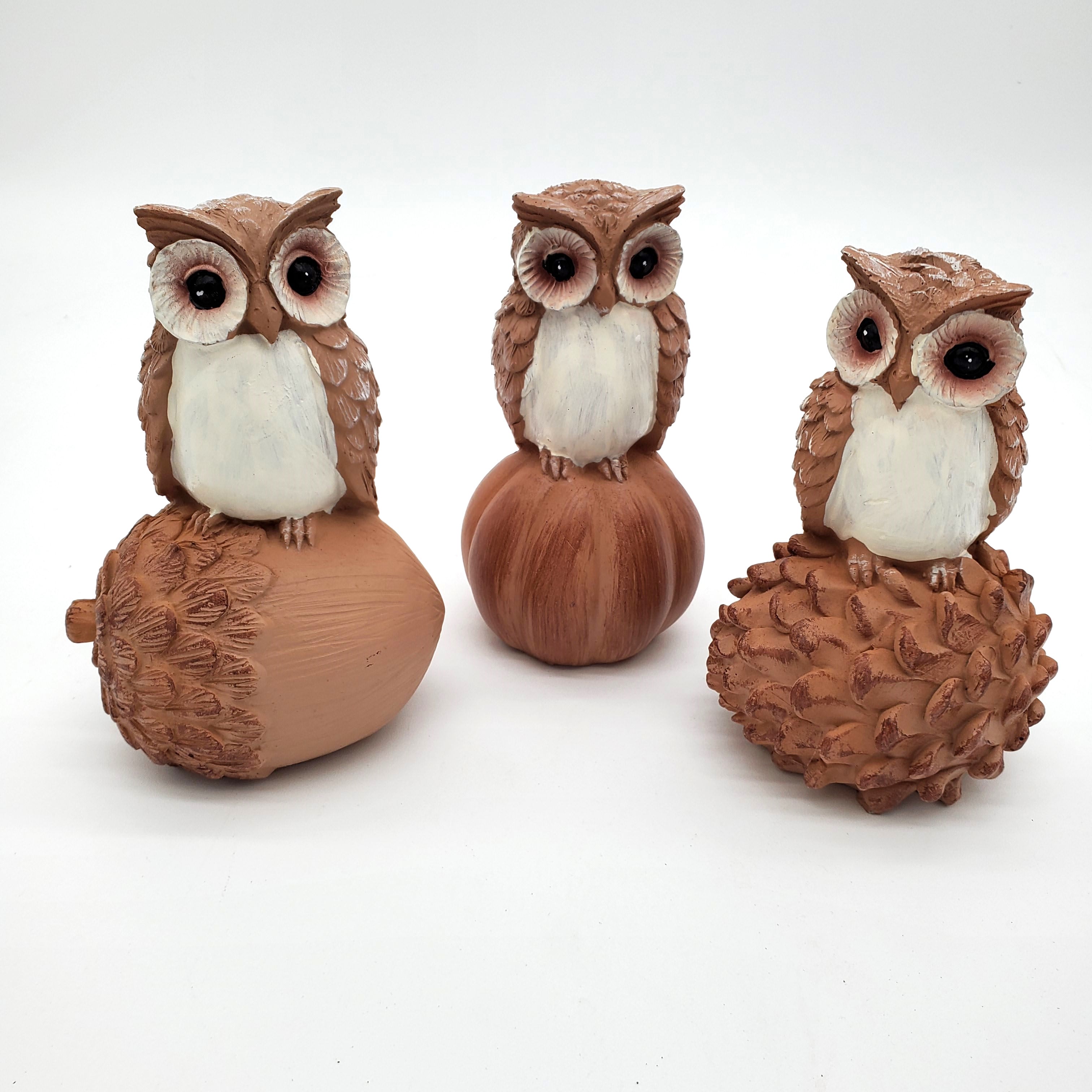 Little Owls Sitting on Autumn