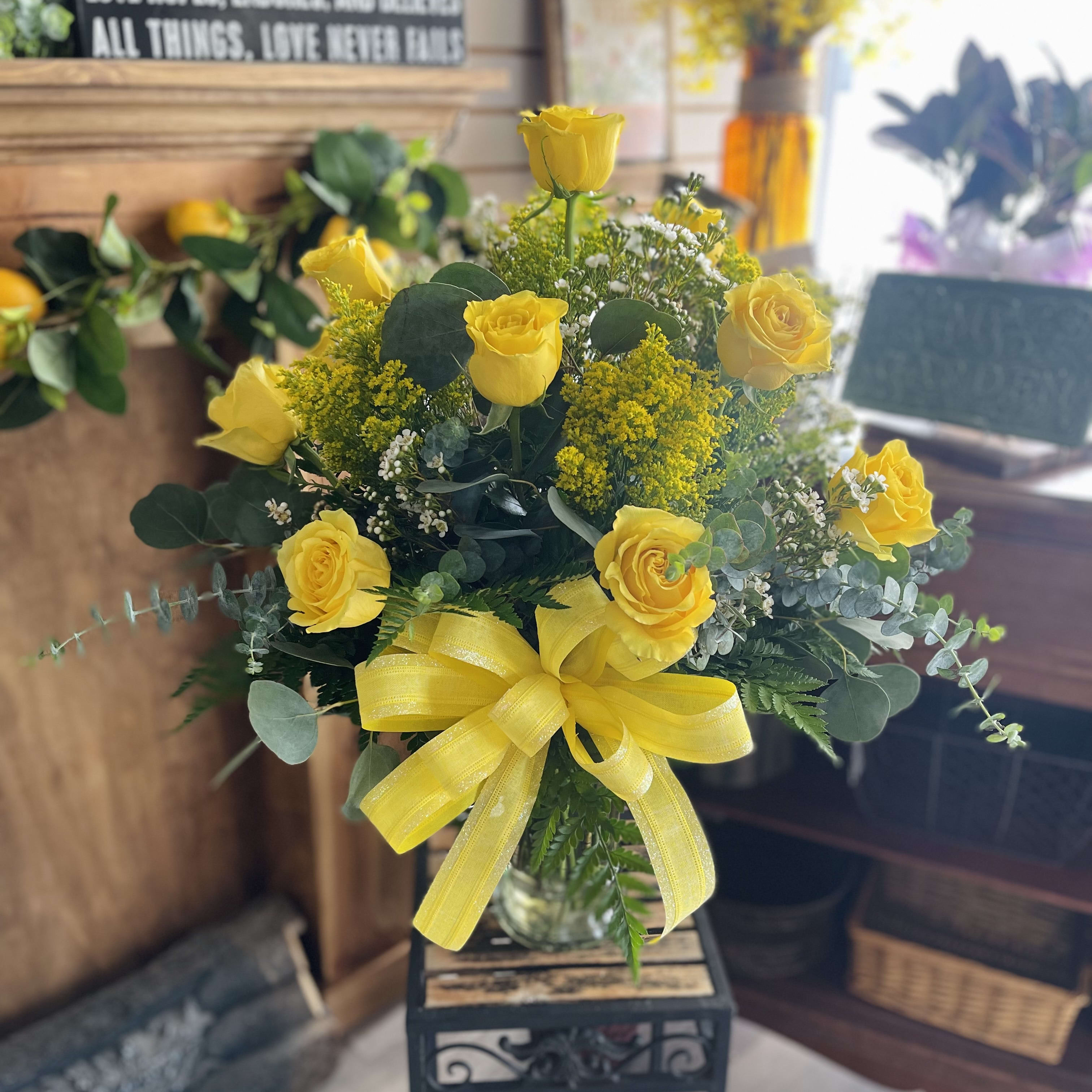 Dozen Yellow Roses in a vase