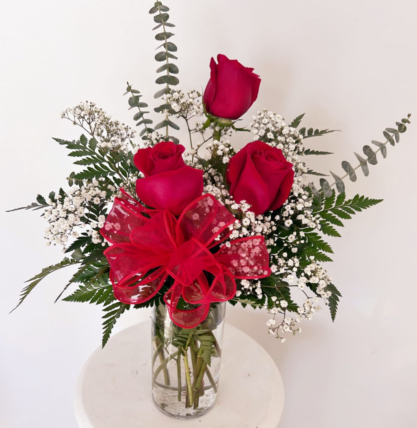 Three Red Roses in a Vase