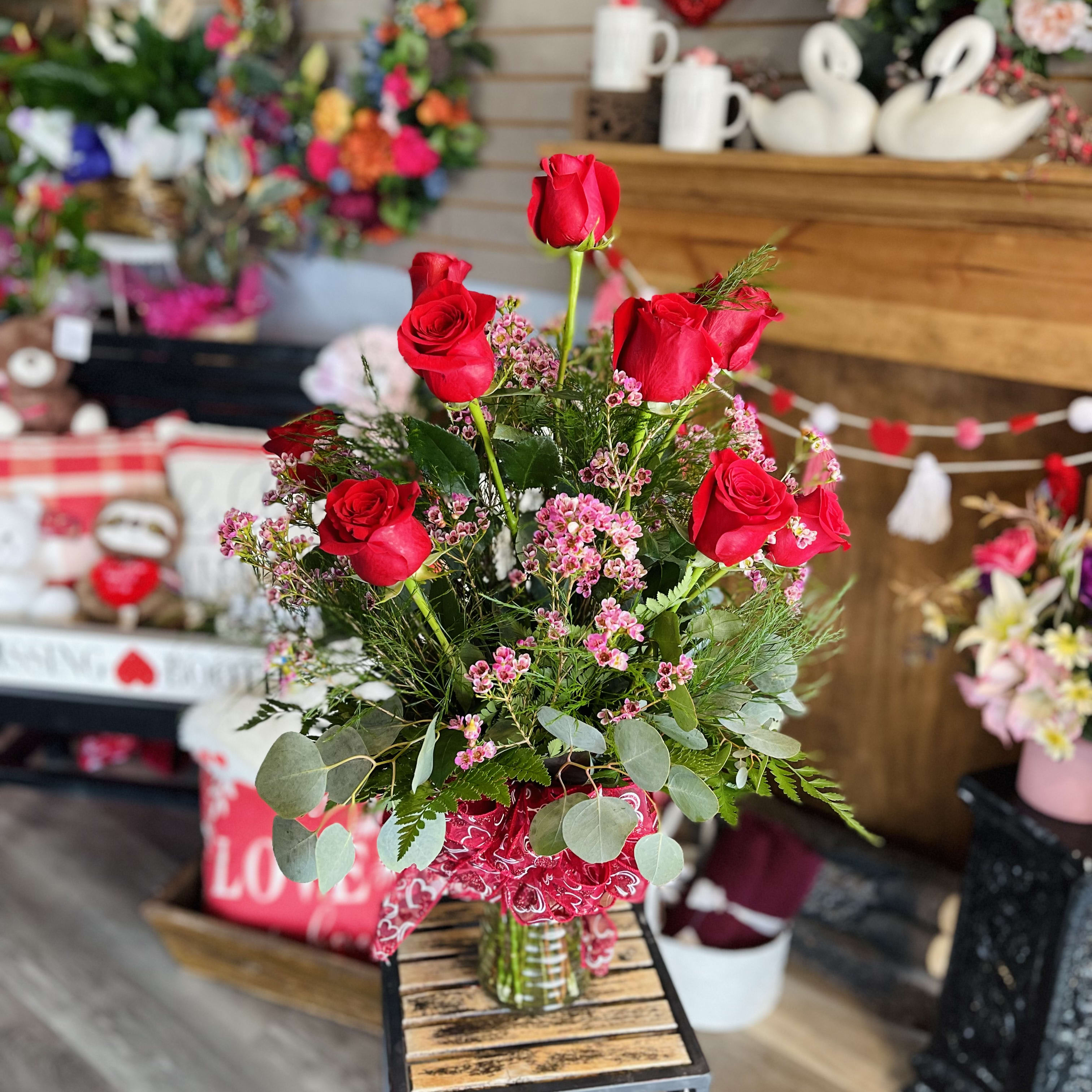 Dozen Red Roses in a vase