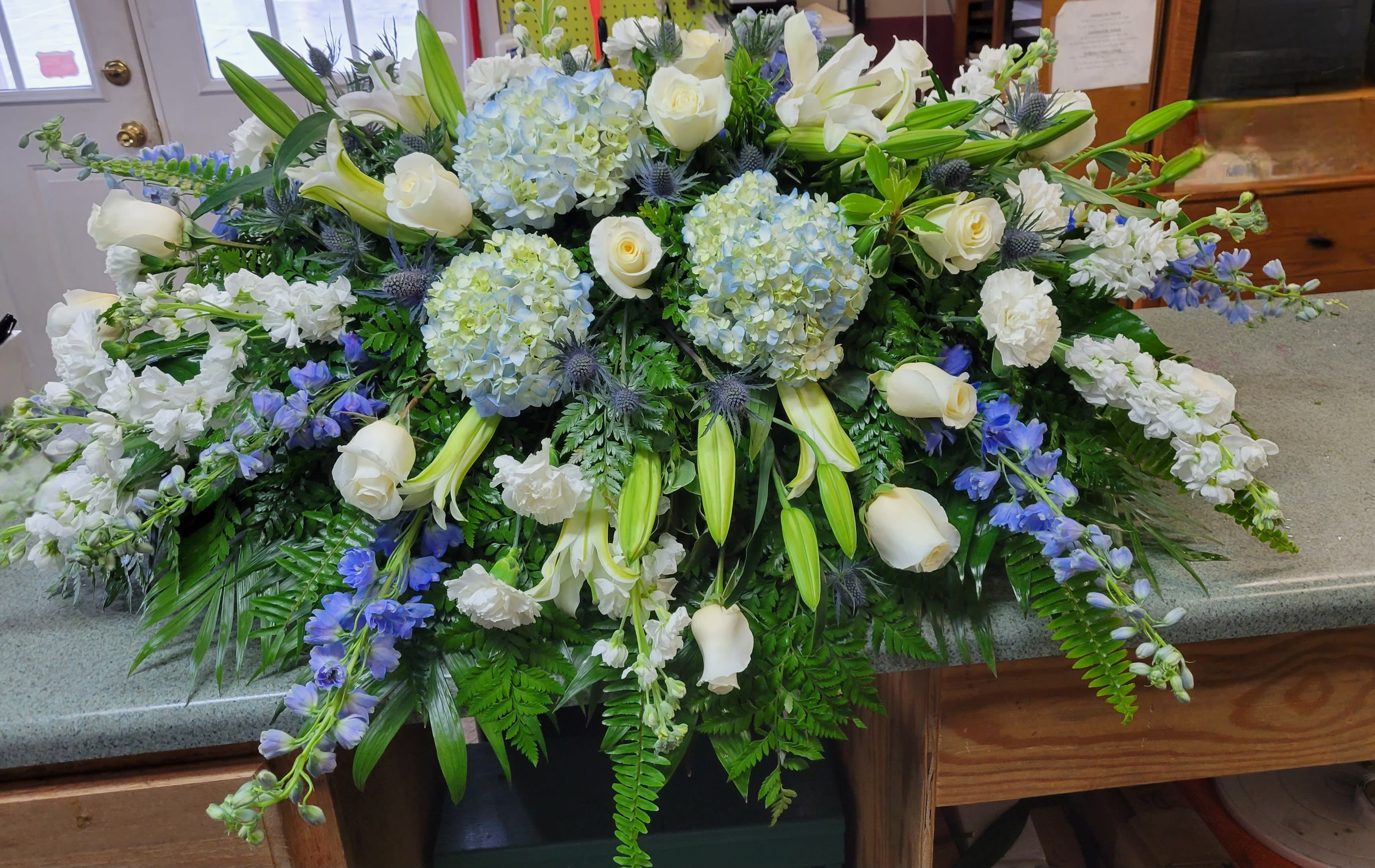 Blue and White Casket Spray