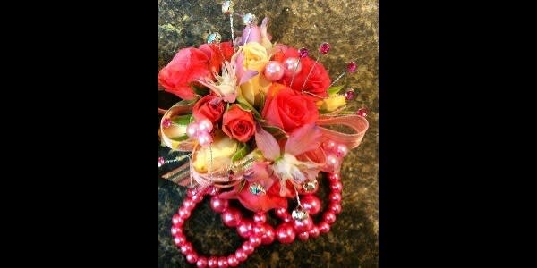 Orangey Peach Wrist Corsage Flower Bouquet