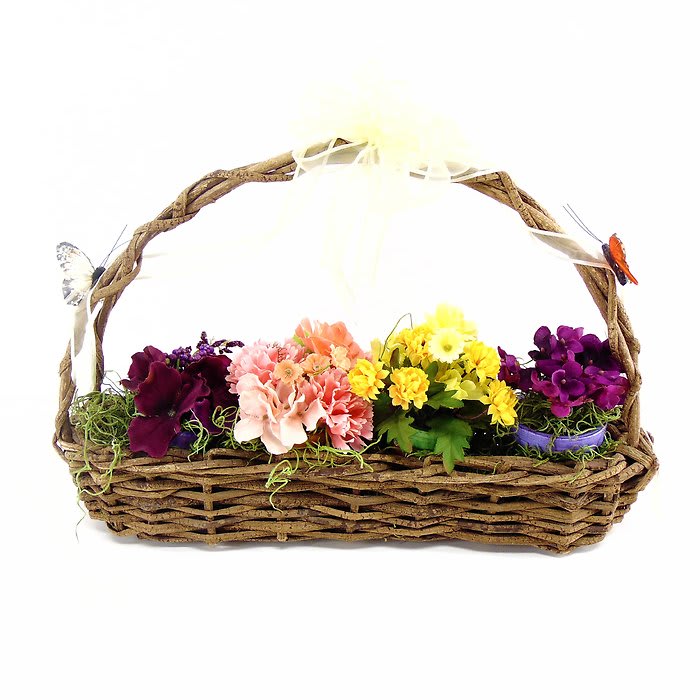 Silk flower mini pots in garden basket.