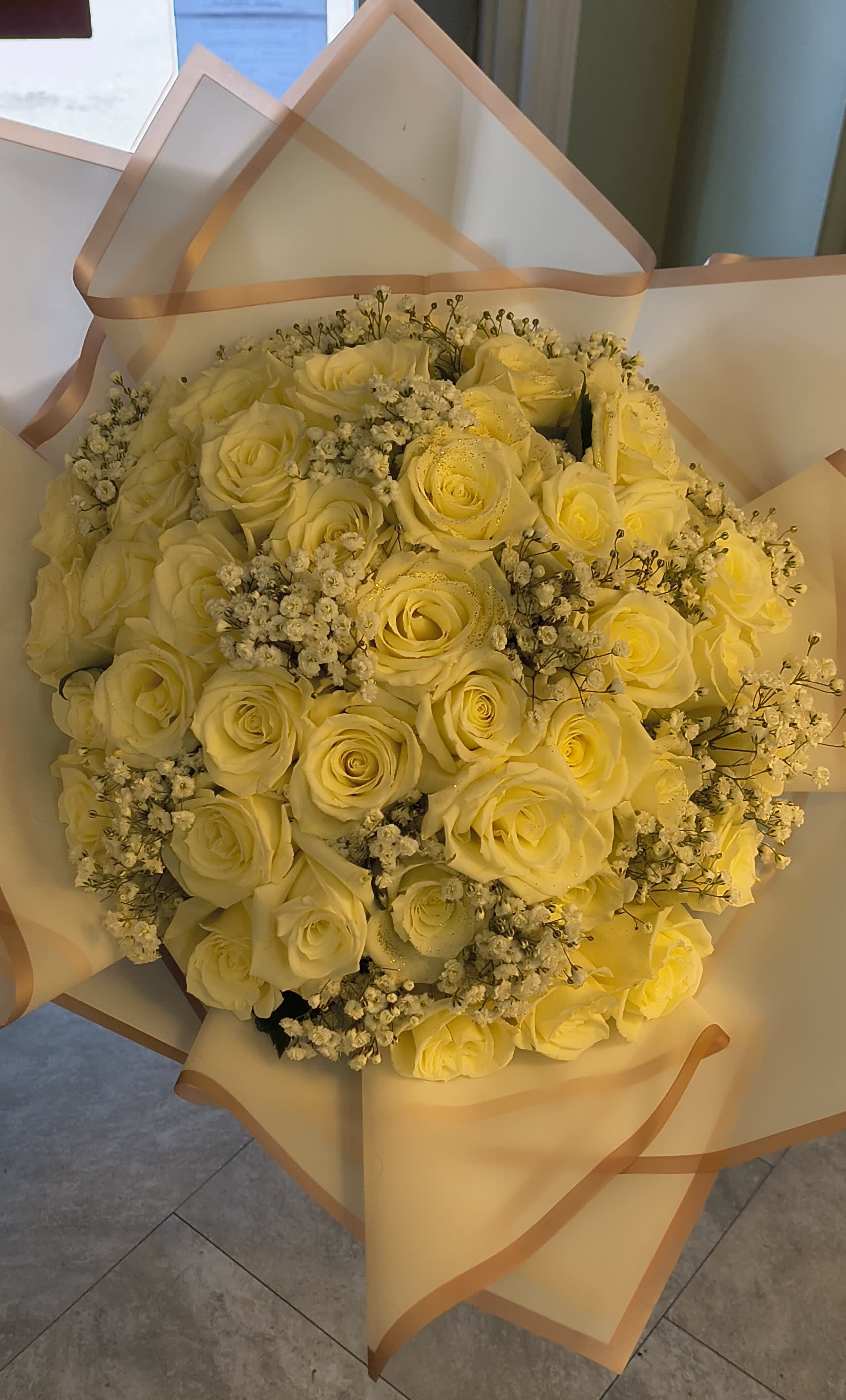 Sunny Bliss Wrapped Roses