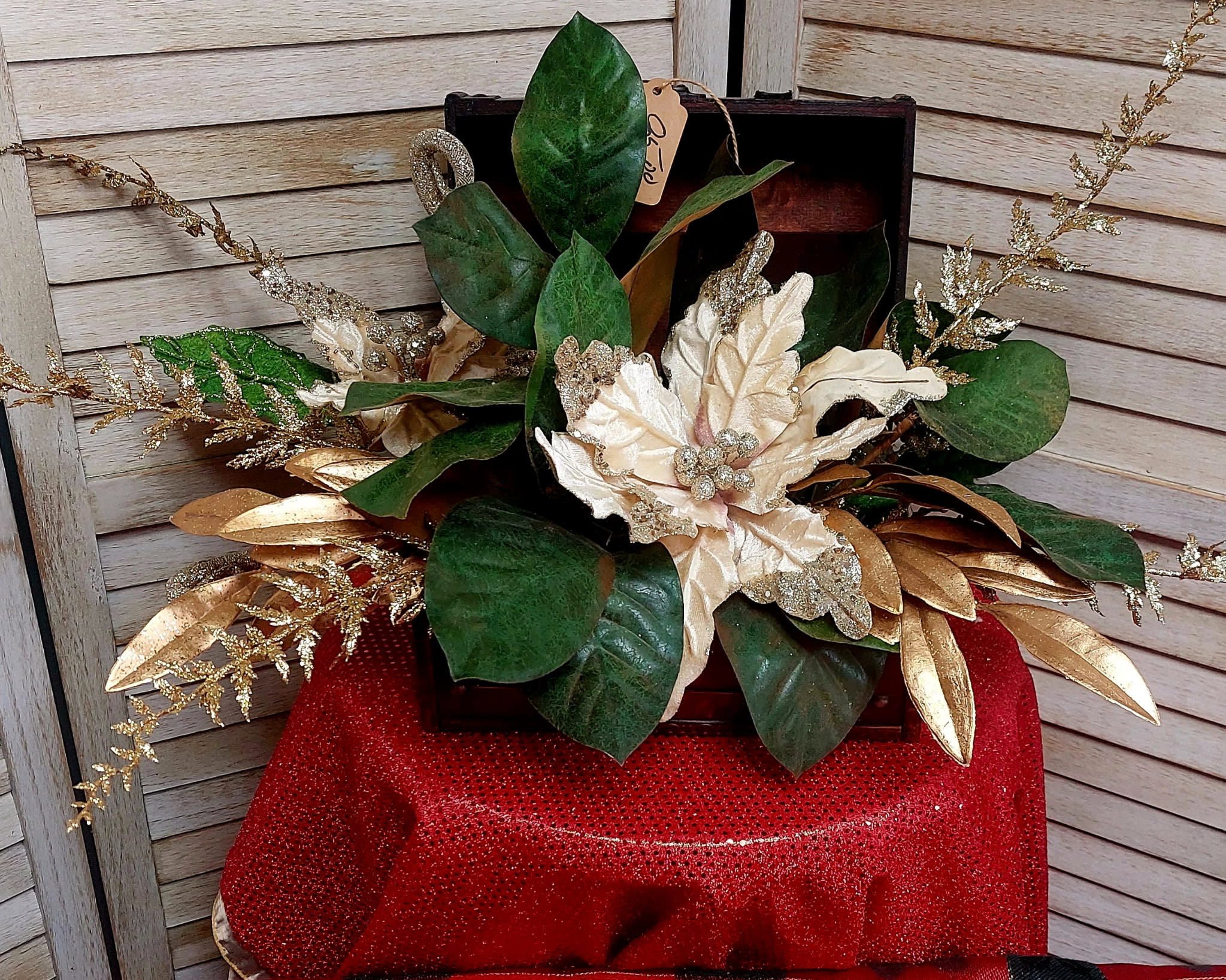 Pretty Poinsettia And Magnolia Trunk Flower Bouquet