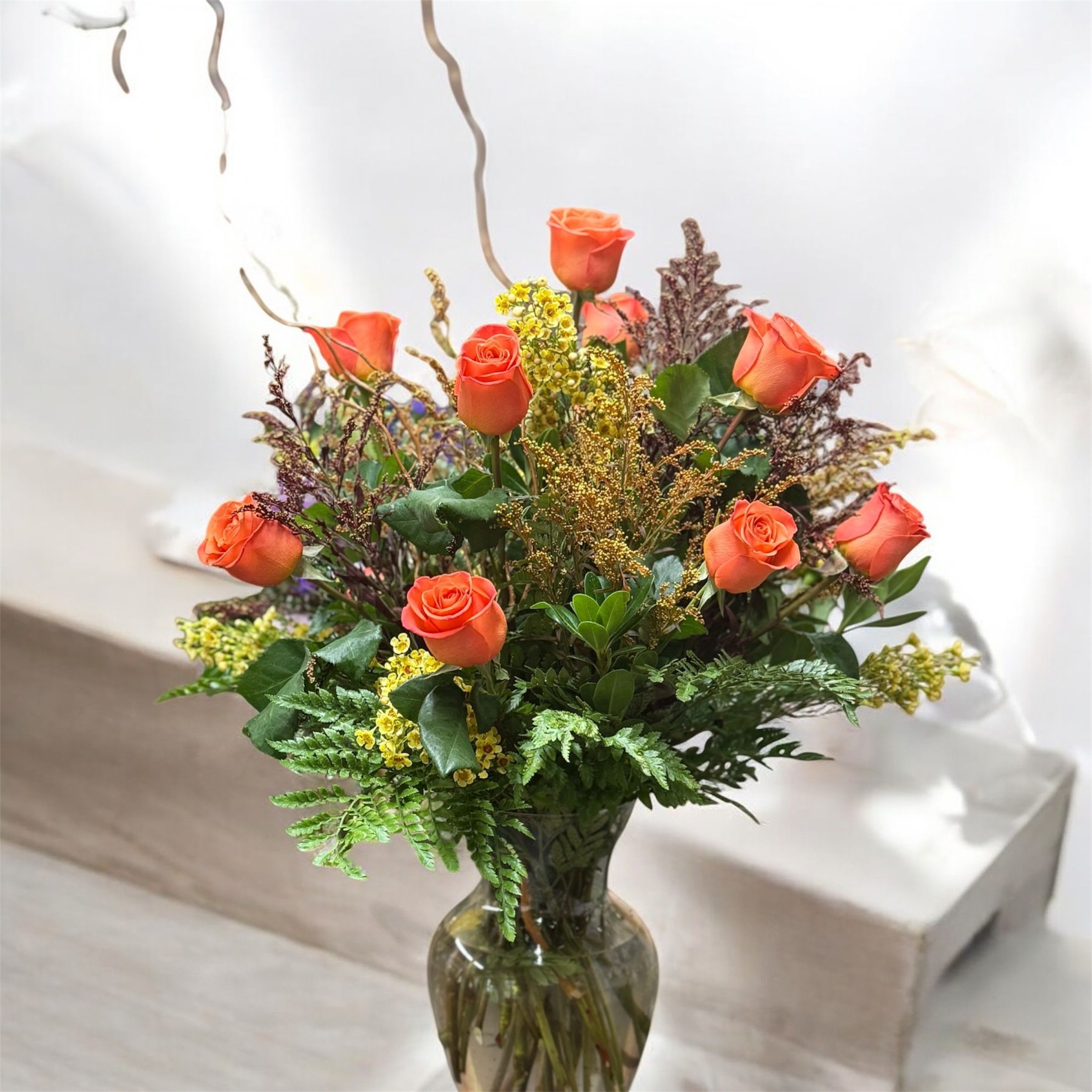 Autumn Dozen Roses in a Vase