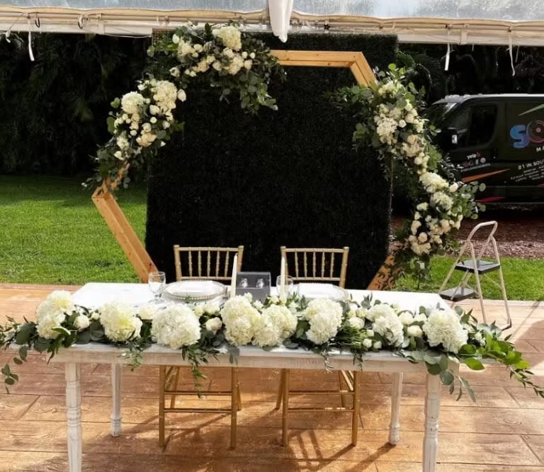 Bride and groom table flowers by Tropical Arrangements, Randallstown MD