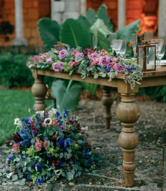 Bride and groom table flowers by Tropical Arrangements, Randallstown MD