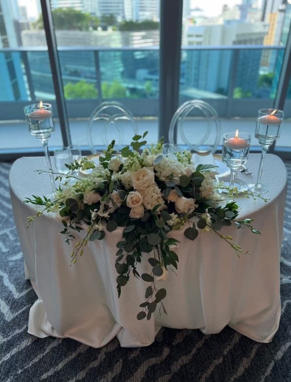 Bride and groom table flowers by Tropical Arrangements, Randallstown MD