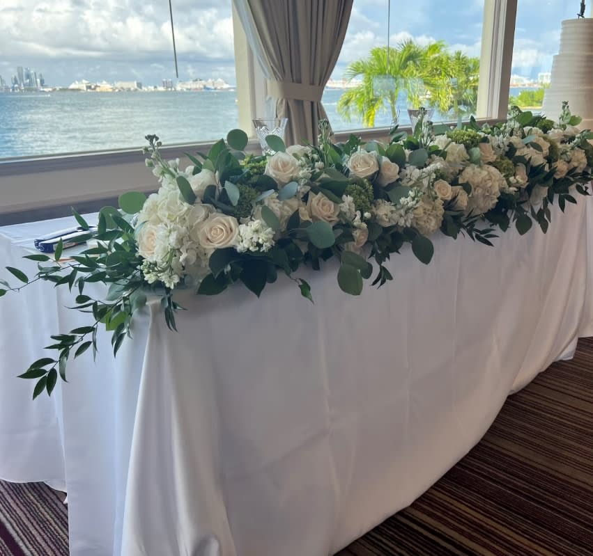 Bride and groom table flowers by Tropical Arrangements, Randallstown MD