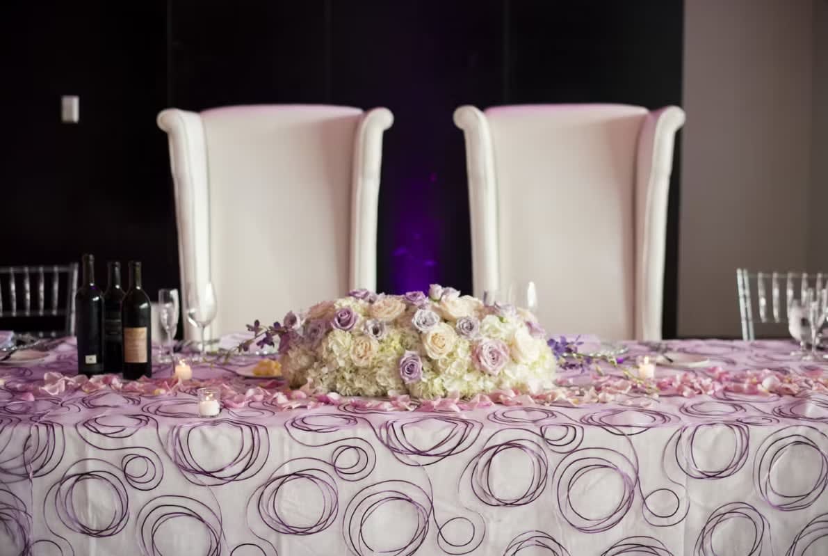 Bride and groom table flowers by Tropical Arrangements, Randallstown MD