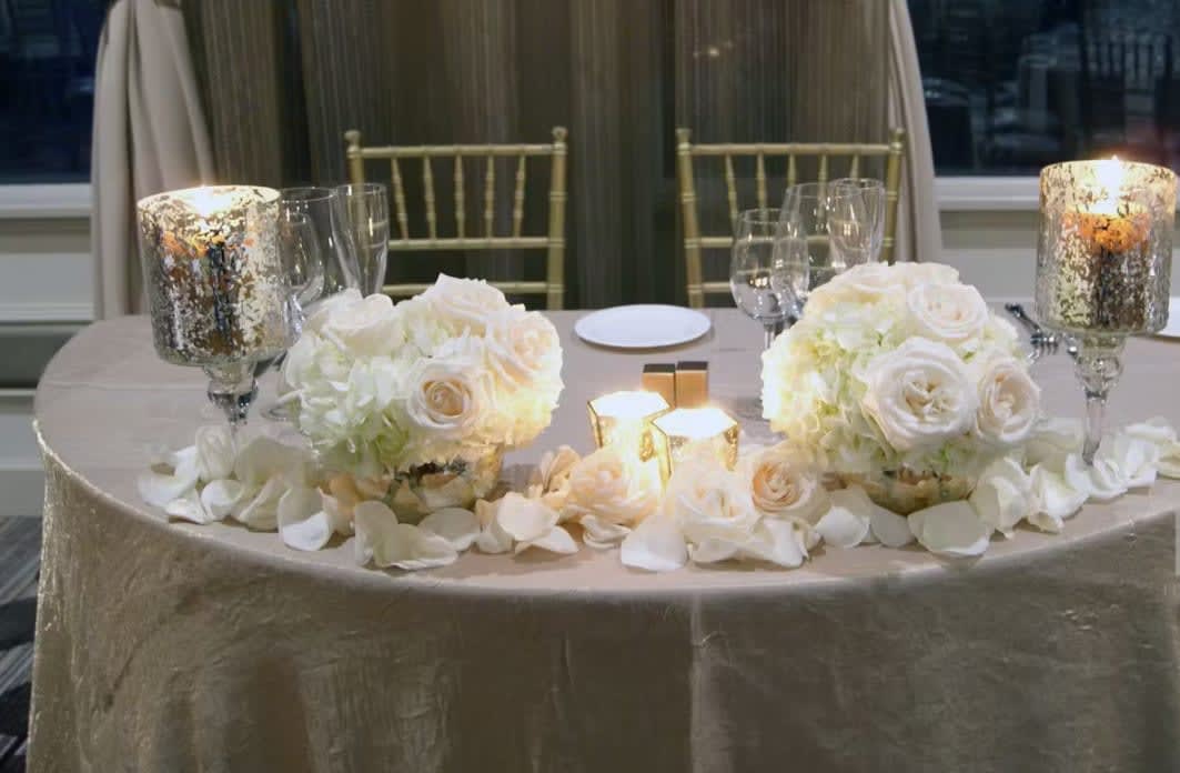Bride and groom table flowers by Tropical Arrangements, Randallstown MD