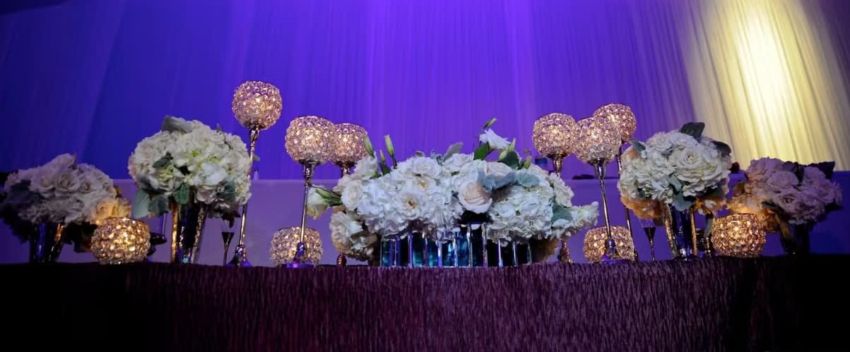 Bride and groom table flowers by Tropical Arrangements, Randallstown MD