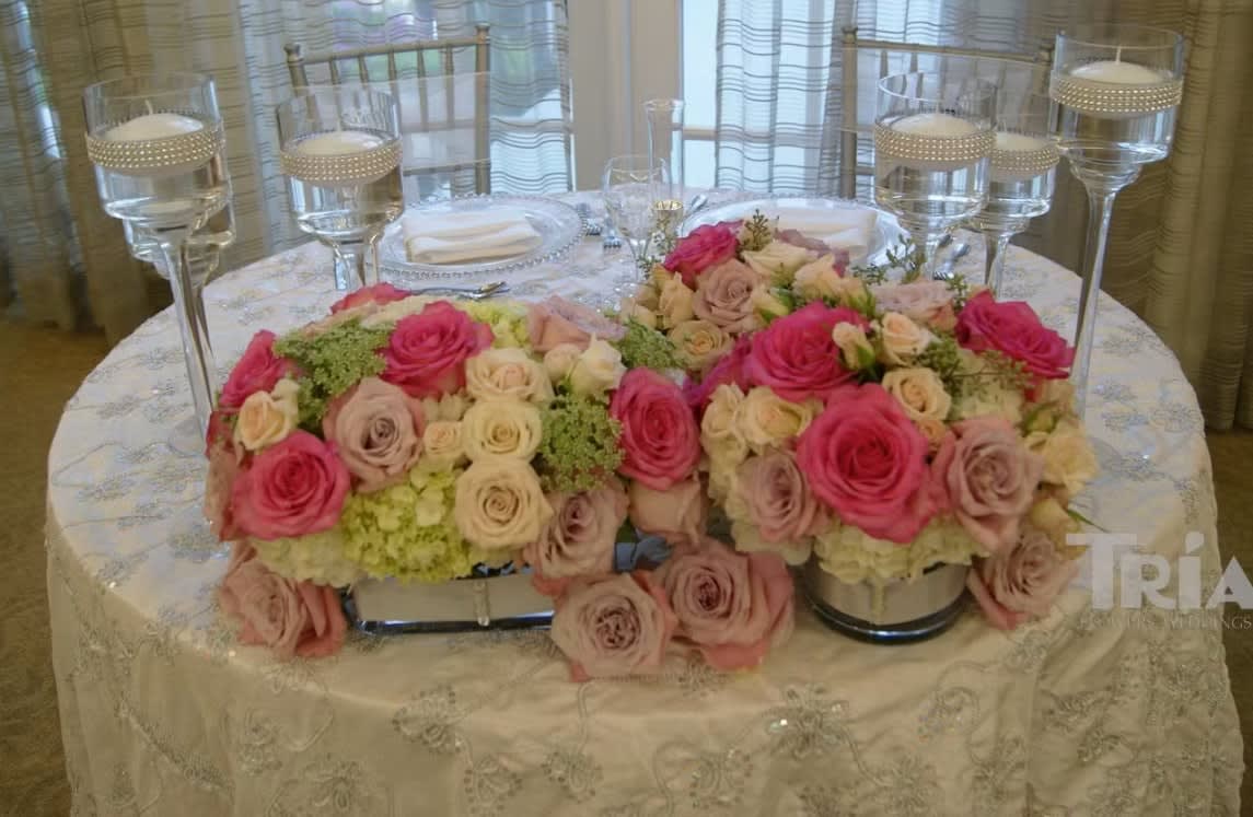 Bride and groom table flowers by Tropical Arrangements, Randallstown MD