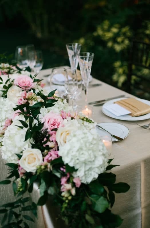 Bride and groom table flowers by Tropical Arrangements, Randallstown MD