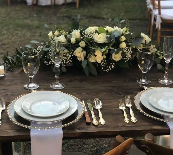 Bride and groom table flowers by Tropical Arrangements, Randallstown MD