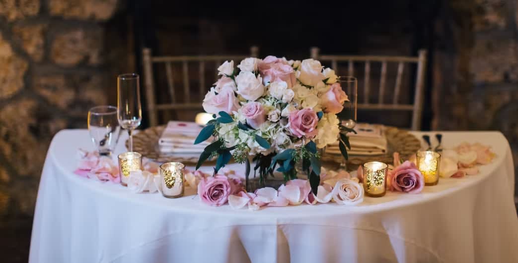 Bride and groom table flowers by Tropical Arrangements, Randallstown MD
