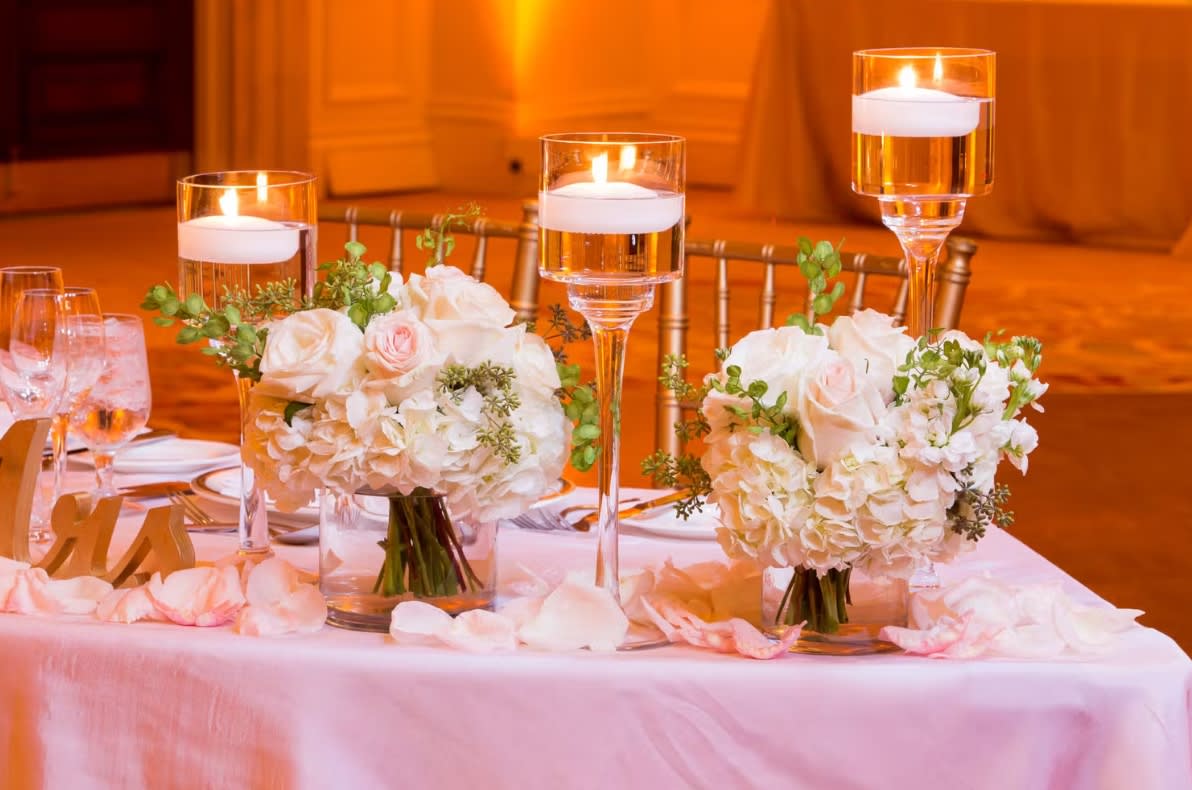 Bride and groom table flowers by Tropical Arrangements, Randallstown MD