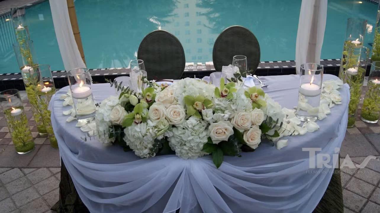 Bride and groom table flowers by Tropical Arrangements, Randallstown MD